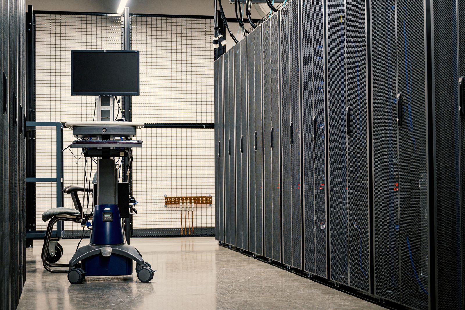 Organized network racks in a professional equipment room